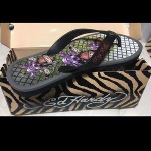 Women’s Ed hardy flip flops.